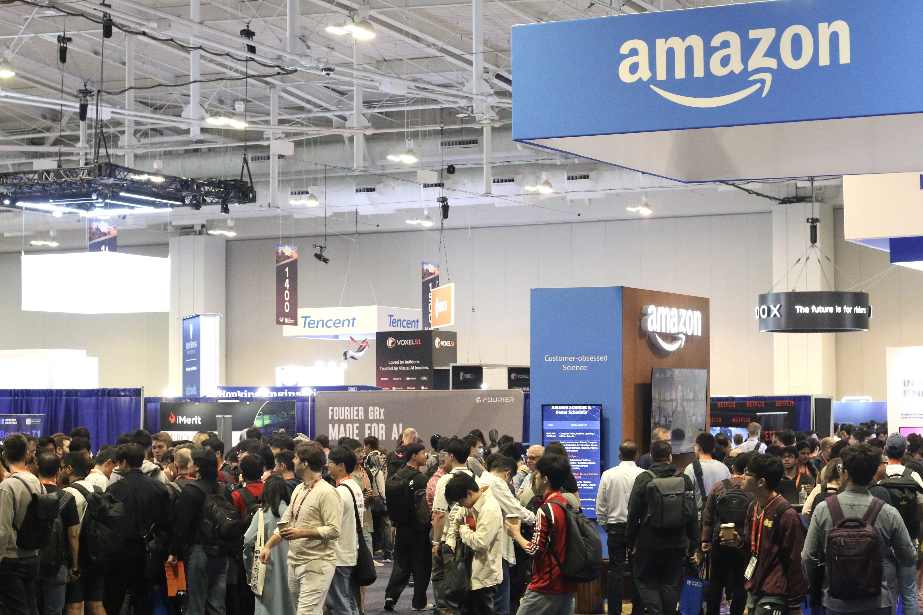 The crowded exhibition hall at CVPR 2025