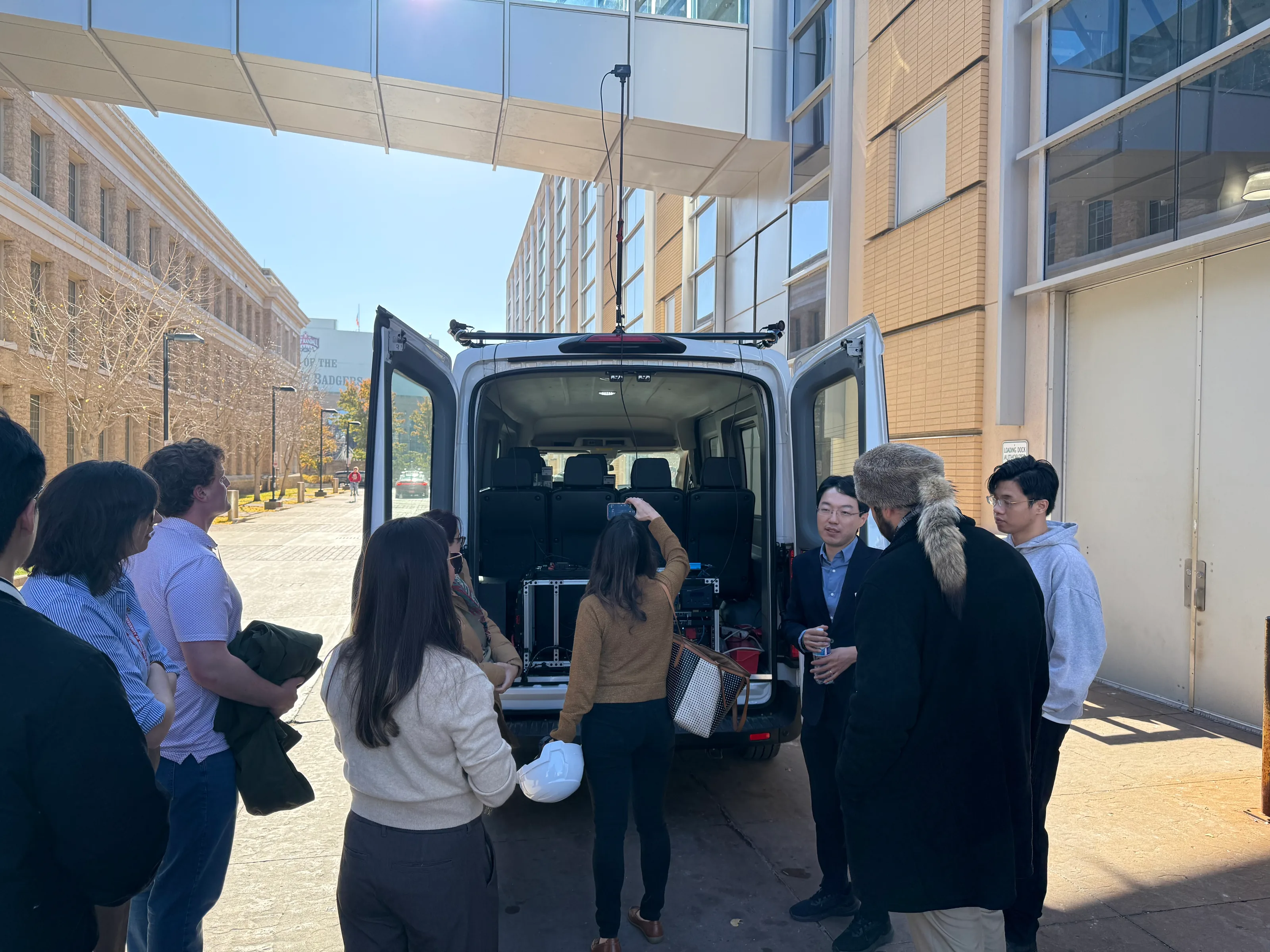 Introducing an autonomous research vehicle to members of Wisconsin's congressional delegation staff at UW–Madison
