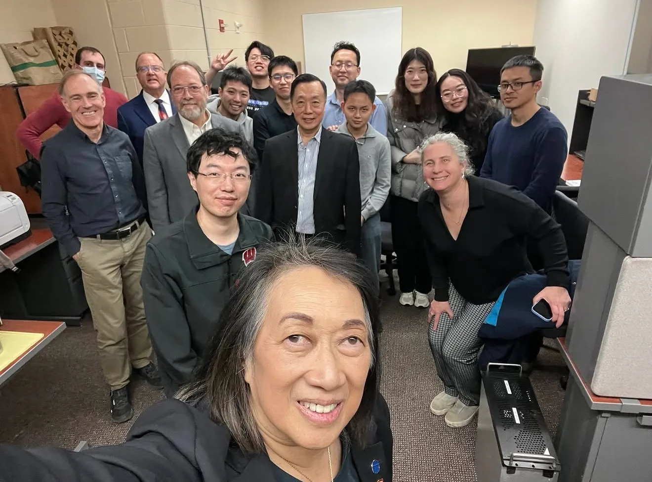 Eva Lerner-Lam with researchers after the remote-driving demonstration