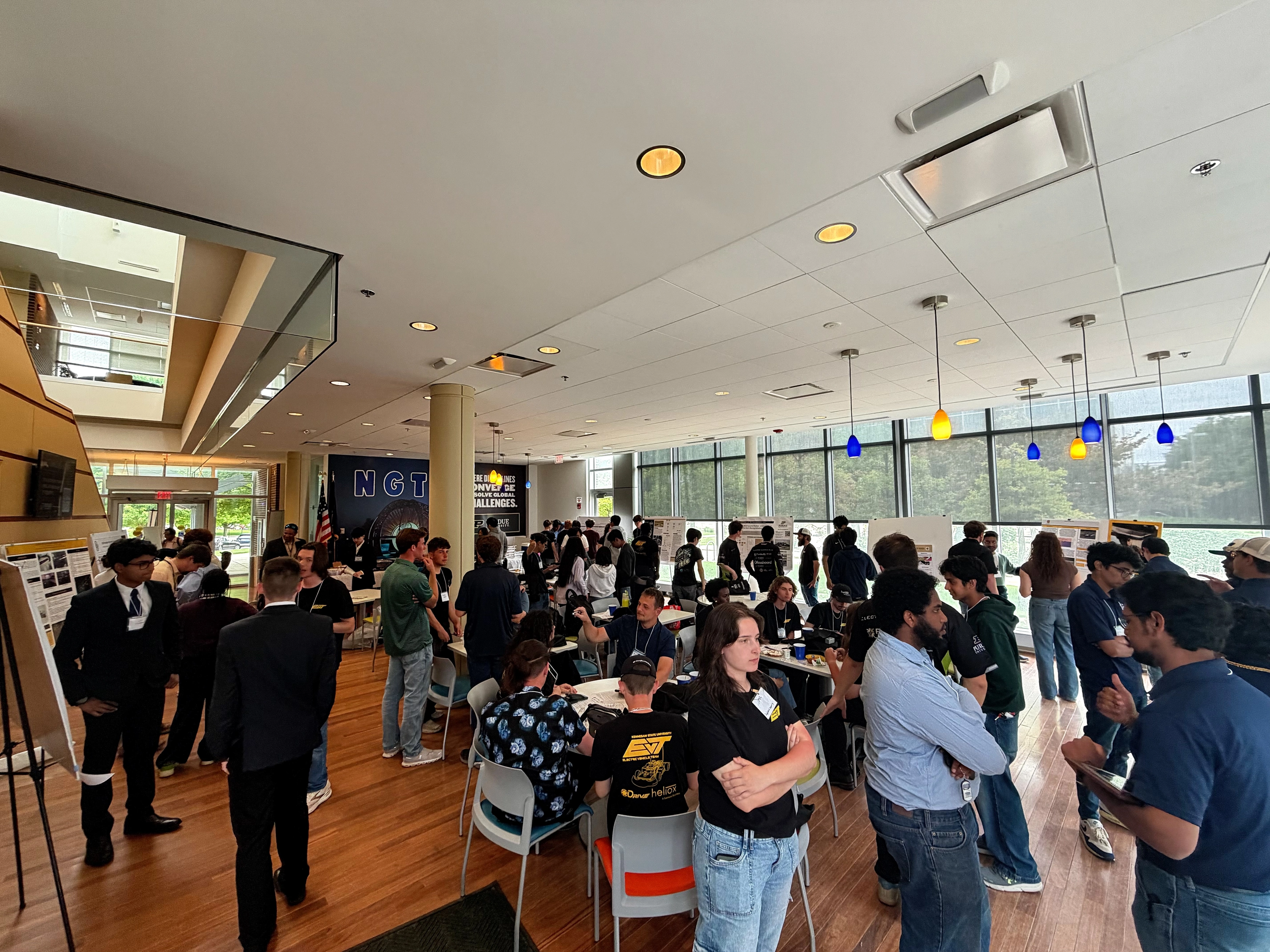 Researchers and attendees networking at NGTS 2026