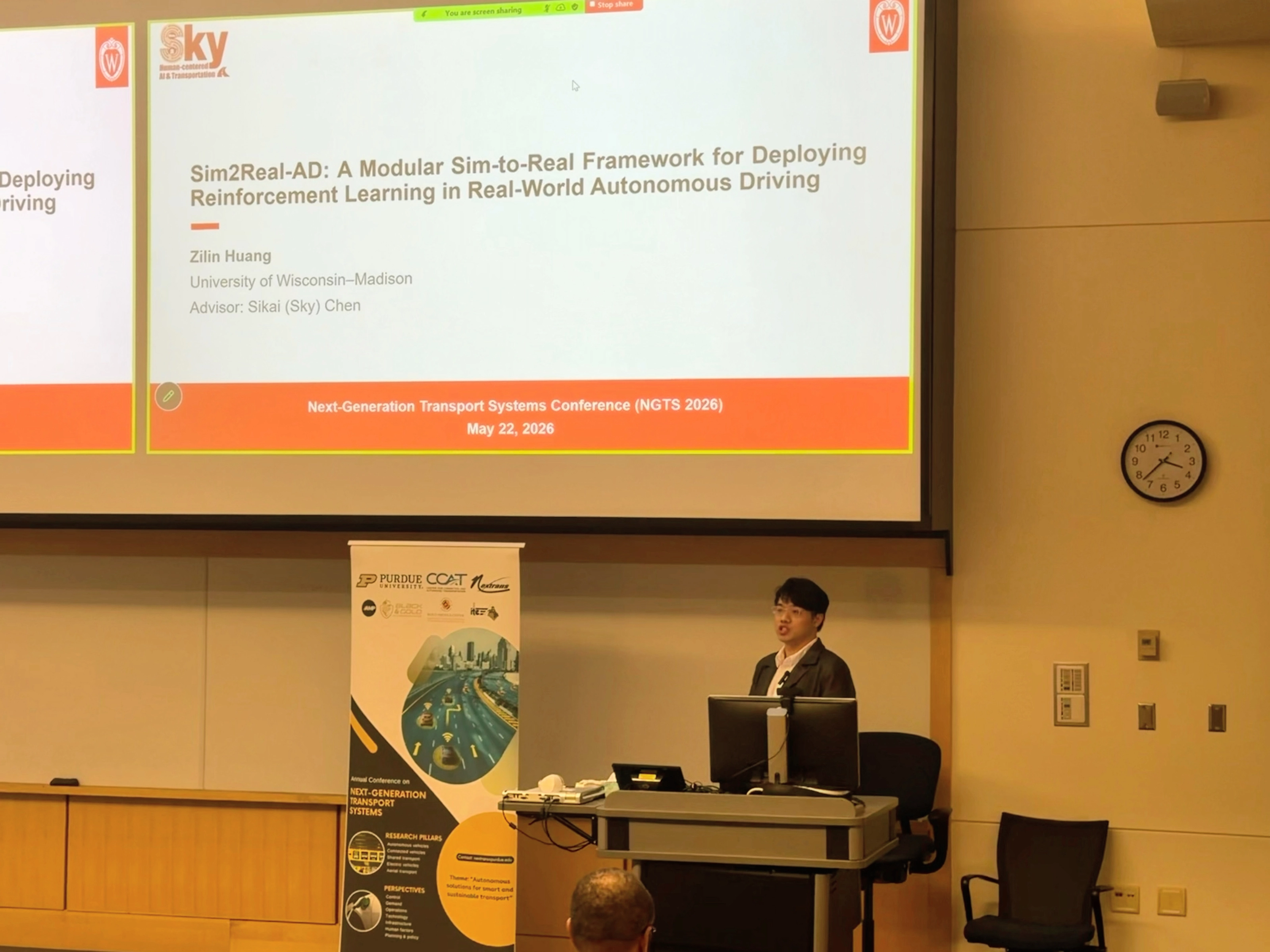 Zilin Huang presenting Sim2Real-AD at NGTS 2026