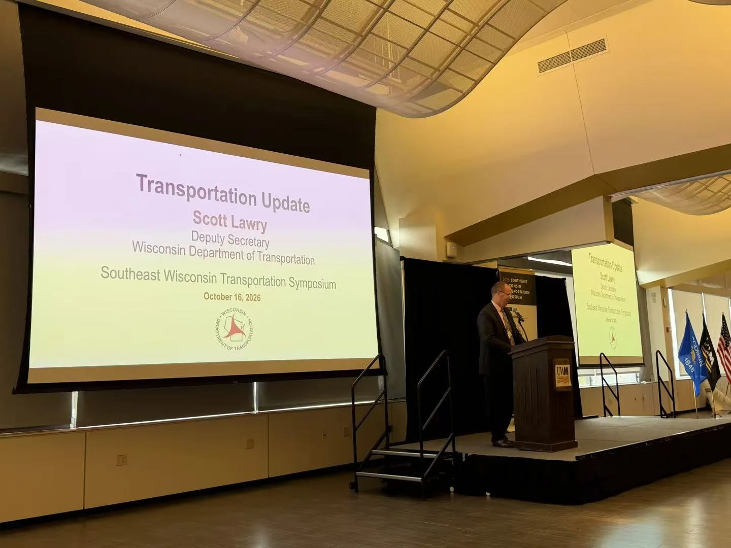 WisDOT Deputy Secretary Scott Lawry providing a transportation update at the 2026 Southeast Wisconsin Transportation Symposium