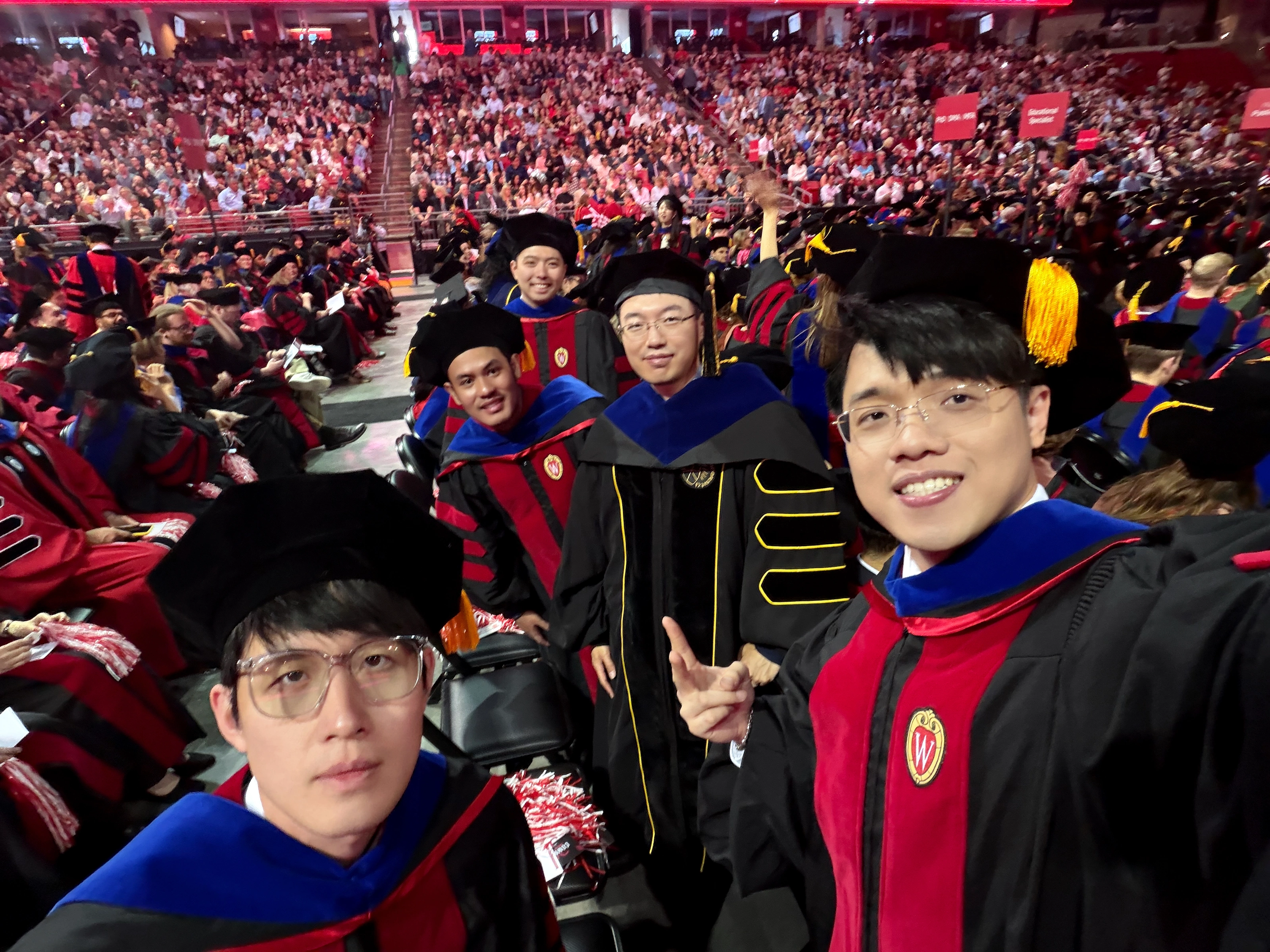 Zilin Huang with friends at the UW–Madison commencement