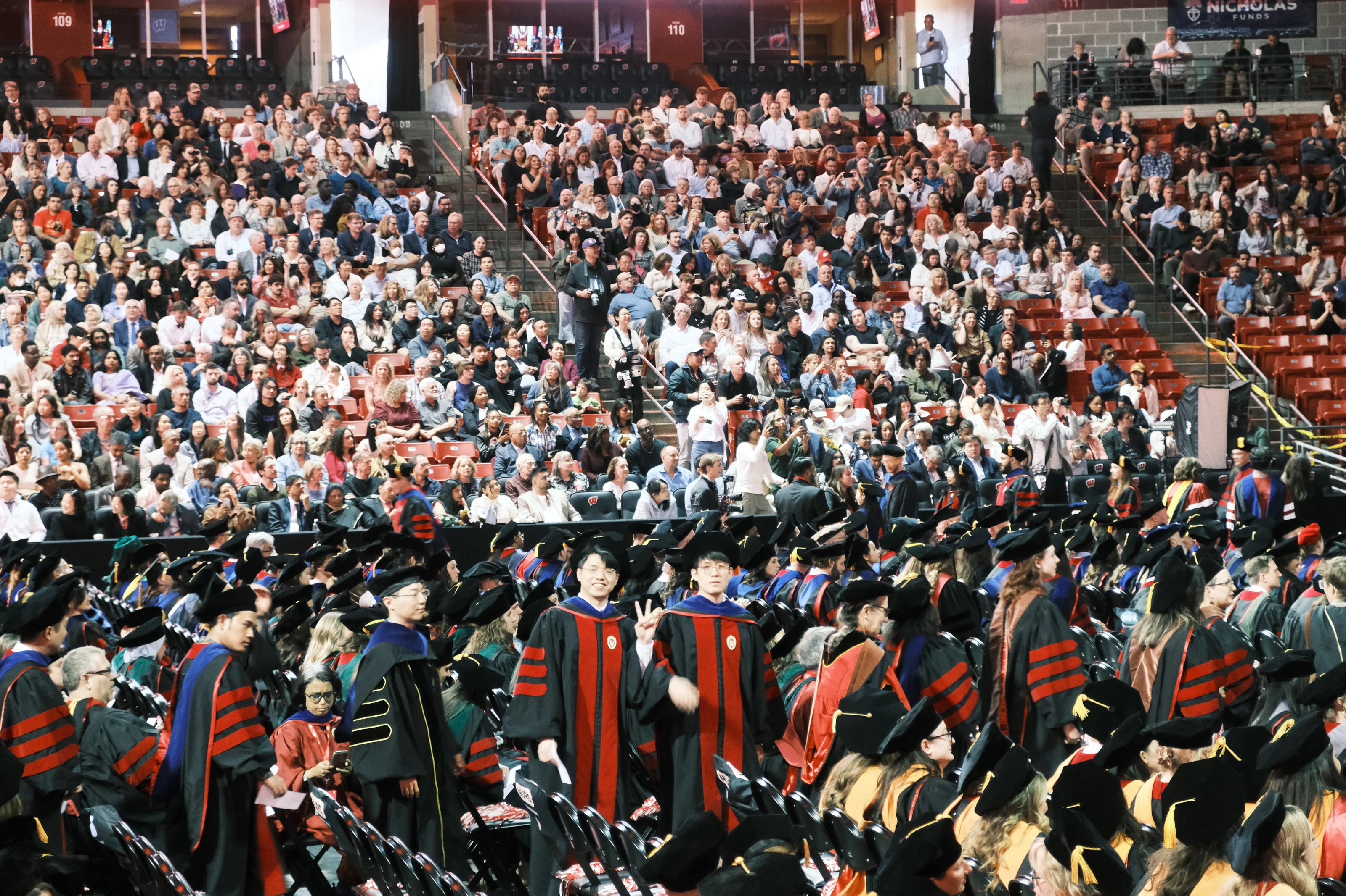 UW–Madison doctoral graduates at the Kohl Center