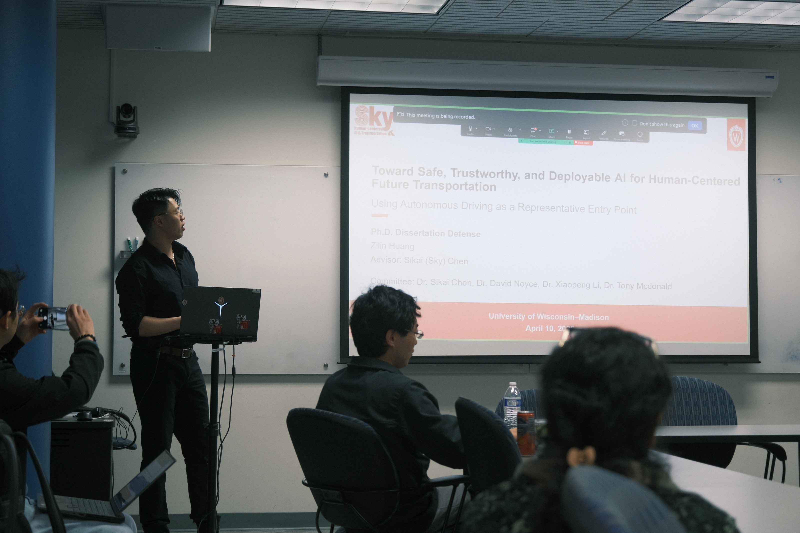 Zilin Huang presenting his Ph.D. dissertation at UW–Madison