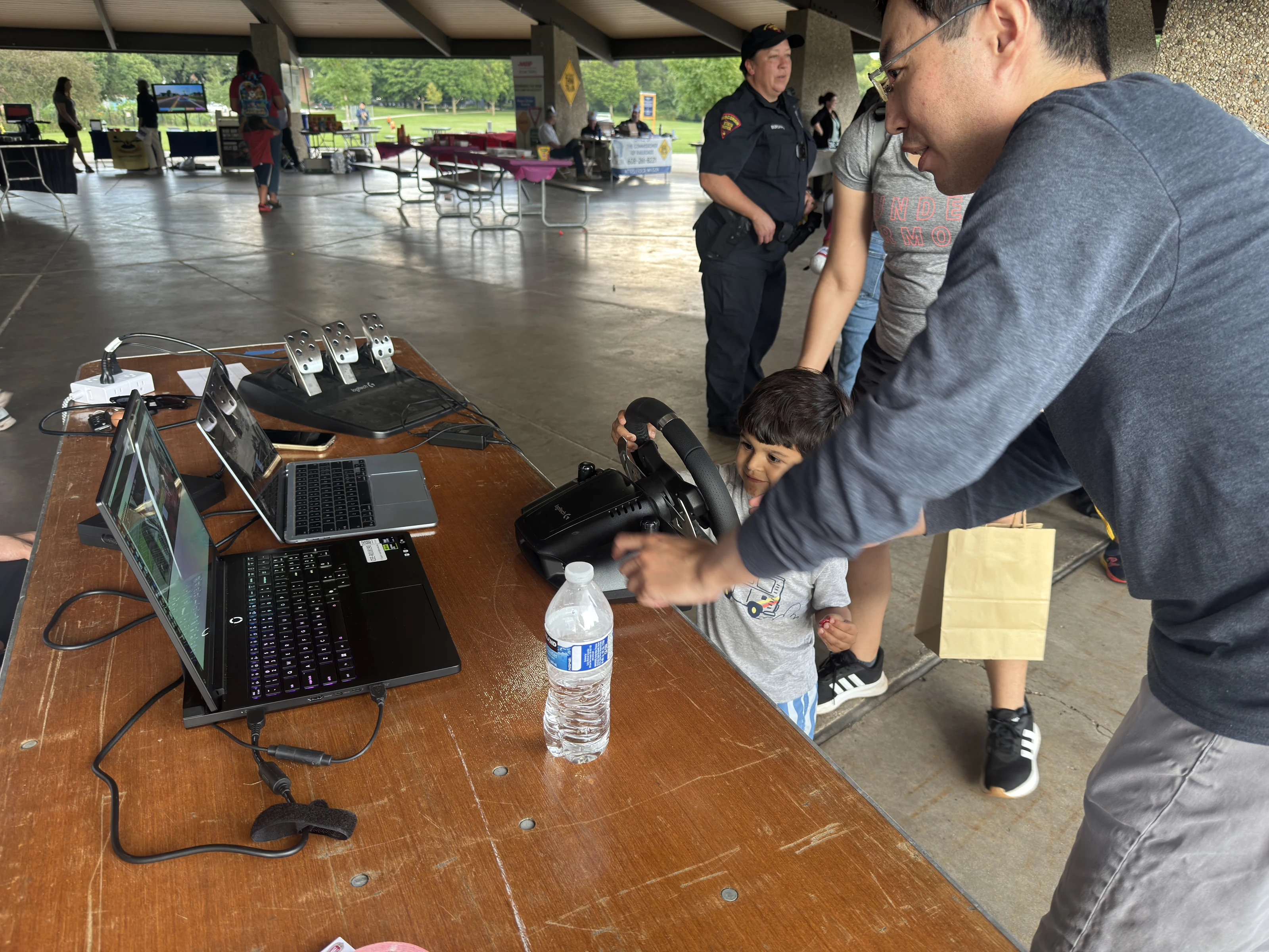 An attendee trying the remote-driving control interface