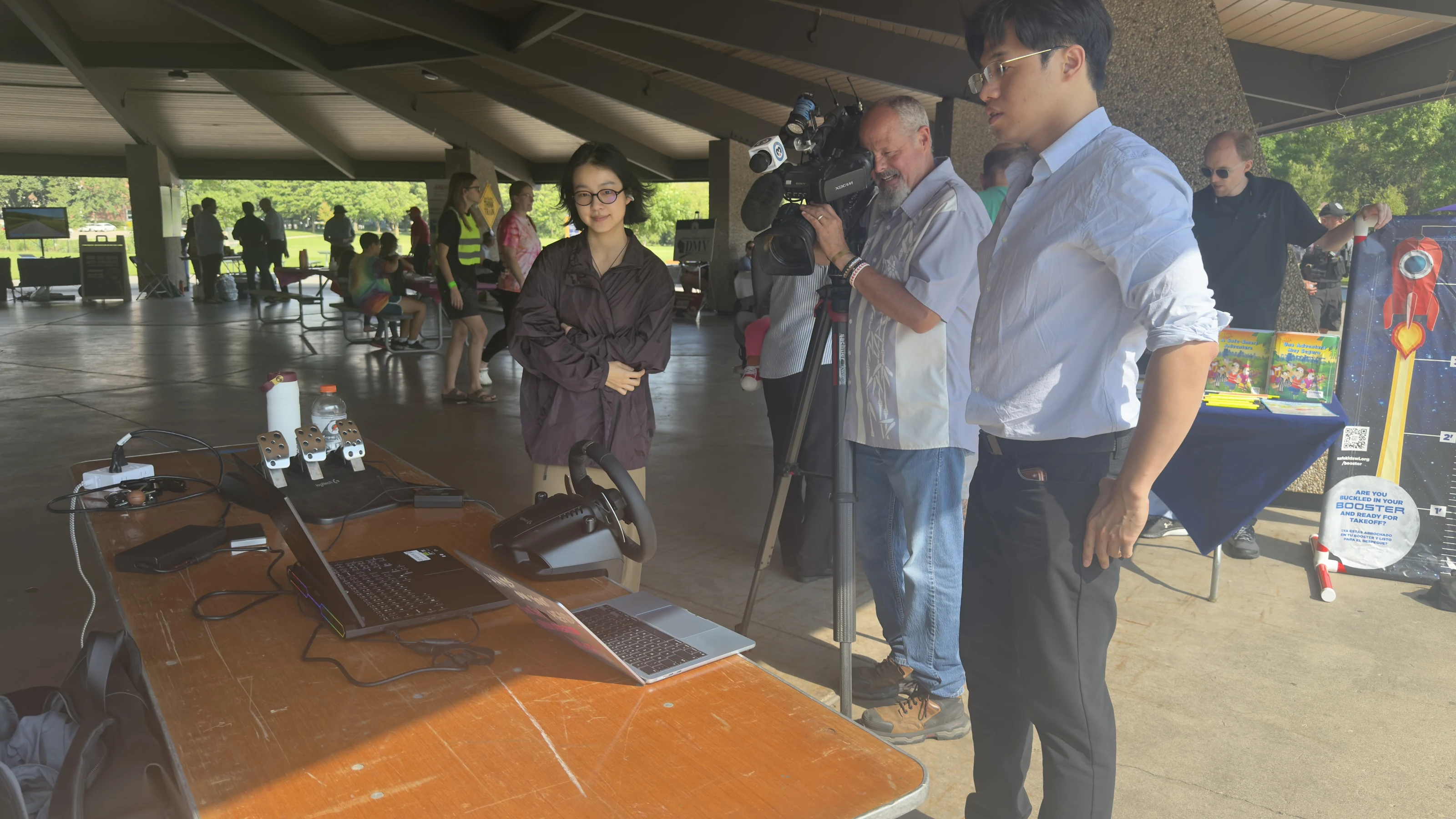 Sky-Lab researchers presenting the remote-driving demonstration