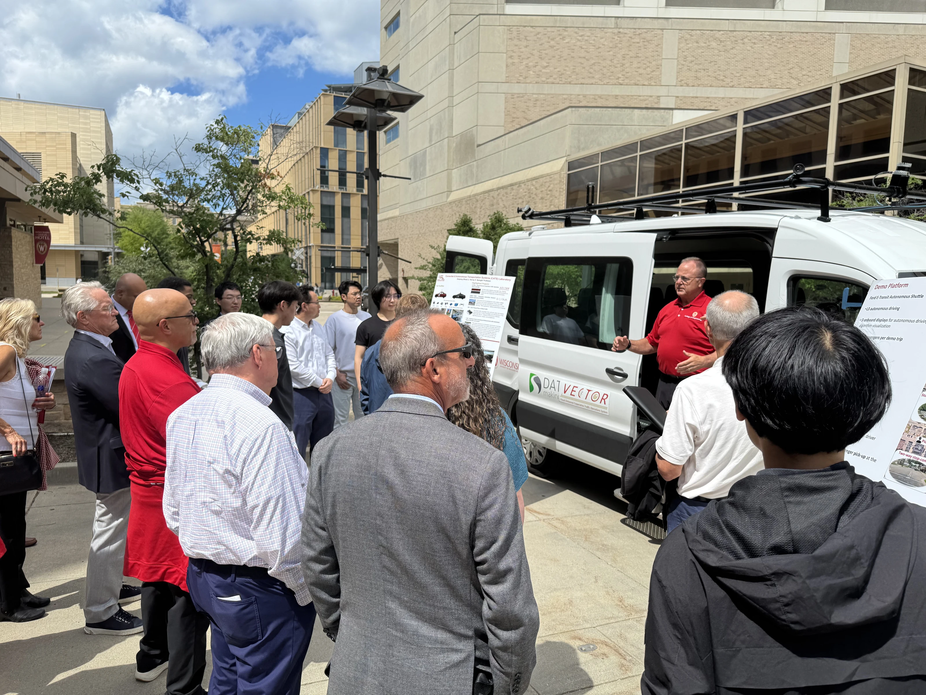 WFAA Board of Directors and Alumni Council members learning about Sky-Lab and CATS Lab autonomous vehicle research