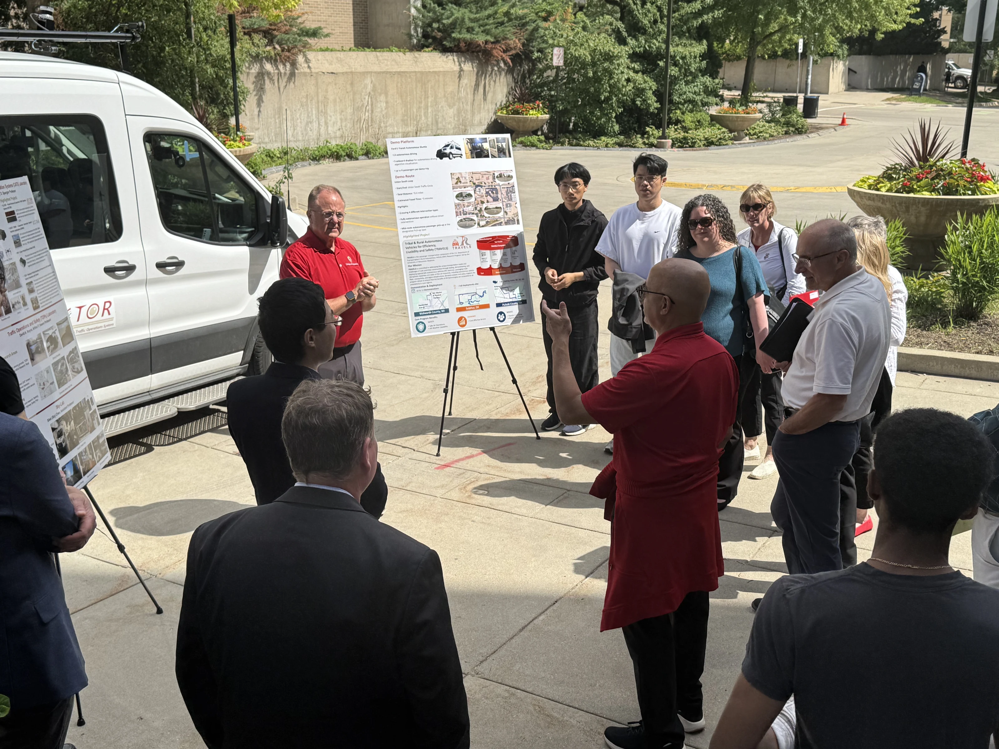 Researchers discussing autonomous transportation with WFAA guests